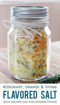 a jar filled with orange and thyme flavored salt