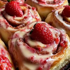 strawberry rolls with icing and strawberries on top