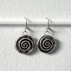 Repurposed Swirl Earrings, made with hypoallergenic metal. Dangle Earrings Silver, Swirl Earrings, Spiral Earrings, Earrings Silver, Crystal Jewelry, Jewelry Earrings Dangle, Swirl, Etsy Earrings, Dangle Drop Earrings