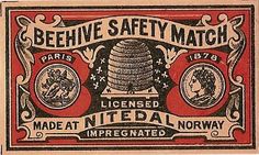 a red and black stamp with the words beehive safety match