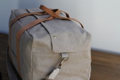 a bag sitting on top of a wooden table