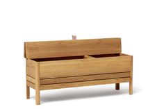 a wooden bench with two drawers on it