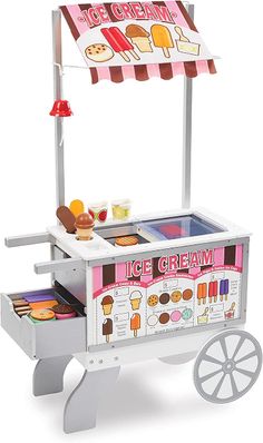 an ice cream cart is shown with wheels