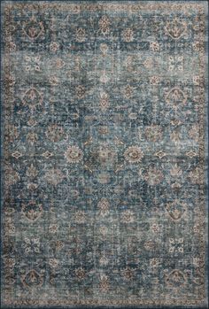 an area rug with blue and beige colors