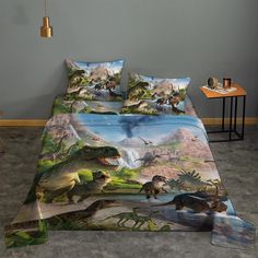 a bed with dinosaurs on it in a room