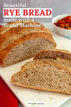 a loaf of rye bread on a cutting board with the words, beautiful rye bread made with a bread machine