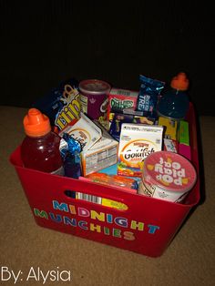 a red box filled with snacks and drinks