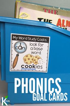 a blue bin with some books in it and the words phonics goal cards