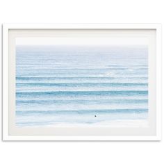 an ocean scene with blue water and white frame