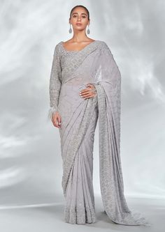 Editor's Note This set features a graceful grey georgette sari paired with a stunning organza full sleeves blouse. The blouse is adorned with self and silver beadwork, sequins, and crystals, ad... Grey Net Saree, Full Sleeves Blouse, Blouse Yoke, Full Sleeve Blouse, Grey Ombre, Net Saree, Sleeves Blouse, Ombre Effect, Full Sleeves