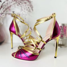 Gucci Tiger Head Metallic Leather Ankle Strappy Sandals Pink Gold Size 8.5 Nwb. The Perfect Pair Of Party Shoes - These Gucci Multicolor Metallic Sandals Will Make You Shine All Night Long! Strappy Crisscross Design. Ankle Strap With An Adjustable Buckle. Peep Toe. Stiletto Heel. Made In Italy. Nappa Silk. Posh Ambassador Ii, 5avg Rating, Ship Quickly! Bundle 2 Or More Items For An Automatic 10% Off Discount And To Save On Shipping! Women's Size: Us 8.5 / Eu 38.5 / Uk 6.5 Material: Leather Upper Glamorous Pink Sandals With Branded Heel Counter, Spring Gucci Heels For Party, Gucci Heels For Spring Party, Gucci Ankle Strap Heels For Spring, Gucci Open Heel Heels For Spring, Gucci Designer Pointed Toe Sandals, Gucci Sandals For Spring Party, Designer Pink Sandals For Party, Gucci Ankle Strap Heels