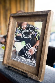 a wooden frame with a sign on it that says, all you need is drink and no more margaritas