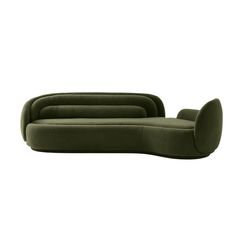 a green couch sitting on top of a white floor