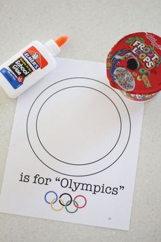 an olympic coloring book with markers and glue