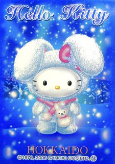 an image of hello kitty holding a teddy bear