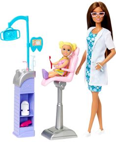 a barbie doll is standing next to a dentist's chair and toothbrush holder