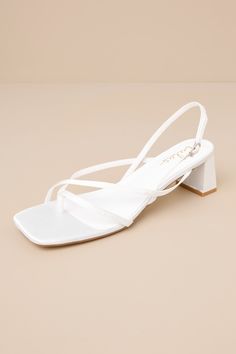 Subtly sultry and always chic, the Lulus Kerrie White Satin Strappy Low Heel Sandals will add a luxe to touch to any ensemble! Sleek woven satin shapes these unforgettable heels that have a square footbed, a thong-style upper, and a network of slender straps throughout. A matching, adjustable slingback strap secures with a shiny gold buckle, all atop cute block heel. 2" wrapped block heel. Cushioned insole. Felted rubber sole has nonskid markings. Man made materials. Imported. Lulus | Kerrie Whi White Low Heels, White Sandals Heels, White Kittens, Low Heel Sandals, Sandal Heels, Silky Dress, Black Sandals Heels, White Heels, To Touch