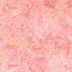 an abstract pink and gold background with circular designs on it's surface, in the middle