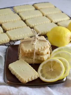 lemon shortbreads and lemon slices on a plate