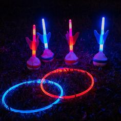 glow in the dark ring tossers and rings on grass