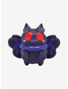 a purple toy with red eyes on it