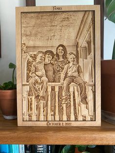 a wooden plaque depicting three women sitting on a porch