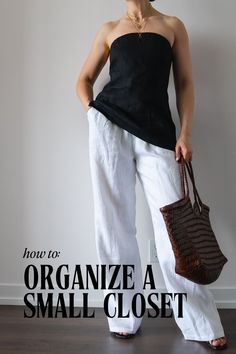 a woman in white pants and black top holding a brown purse with the words how to organize a small closet