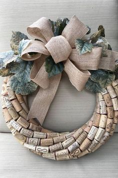 By upcycling wine corks, this design not only celebrates your love for wine but also adds a personal touch to your decor. The earthy tones and textures create a cozy feel, perfect for hanging on your front door or displaying indoors. Cork Wreath Diy, Wine Cork Diy Projects, Wine Cork Crafts Christmas, Cork Diy Projects, Cork Crafts Christmas, Wine Cork Wreath, Wine Cork Diy Crafts, Cork Wreath, Wine Cork Projects