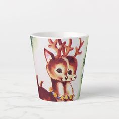 a coffee cup with an image of a deer on it