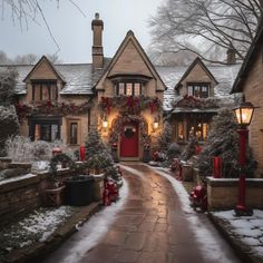 a house decorated for christmas with lights and wreaths