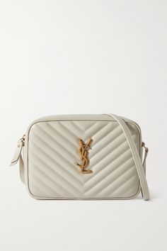 SAINT LAURENT's 'Lou' bag is one of the label's most coveted styles and for good reason - it's sleek, timeless and endlessly versatile. Crafted in Italy from cream leather, it's quilted and decorated with the house's signature 'YSL' logo plaque. The lined interior is perfectly sized to fit your phone, cardholder and compact. Ysl Niki Bag Medium White, Ysl Loulou Bag Cream, Blanc Vintage Ysl Bag, Ysl Lou Crossbody Bag, Ysl Hobo Bag Cream, Ysl Cassandra Bag White, Ysl Bag Mini Lou, Ysl Logo, Fame Dr