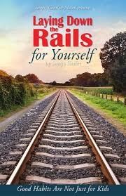 the book laying down the rails for yourself is shown on a train track with grass and trees in the background