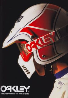 a man wearing a red and white motorcycle helmet