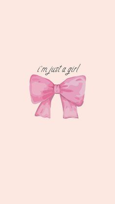 a pink bow with the words i'm just a girl written on it in black ink