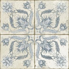 four tiles with blue and white designs on them