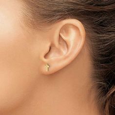 14k yellow gold polished cross stud earrings. Measure approximately 1/4"L x 3/16"W and have post and push back closure. Cross Stud Earrings, Cross Earrings Studs, Yellow Earrings, Magnetic Bracelet, Gold Cross, Gold Polish, Screw Back Earrings, Manufacturing Process, Earring Backs