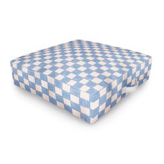 a blue and white checkered mattress on a white background