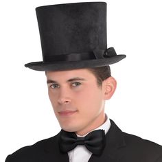 "Get the Adult Deluxe Black Top Hat at Michaels. com. Any gentleman would be lost without this stylish polyester hat accented with black hat band and bow. Top off your look with this Deluxe Black Top Hat. Any gentleman would be lost without this stylish polyester hat accented with black hat band and bow. This hat is perfect for any number of costumes. One size fits most teens and adults. When your Halloween costumes needs a little something extra, add a hat! Details: Black 10.75\" x 11.75\" x 7\ Black Halloween Costume, Top Hat Costume, Black Halloween Costumes, Victorian Hats, Black Top Hat, Casino Outfit, Black Costume, Black Halloween, Costume Hats