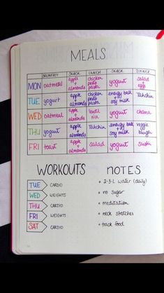 an open notebook with lots of workout notes on the pages and words written in different languages