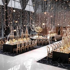 a large room filled with lots of tables covered in gold and white table cloths