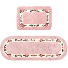 two pink rugs with roses on them and one has a border in the middle