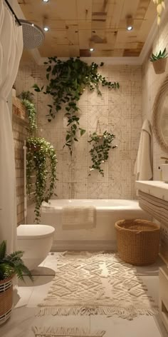 a white bathroom with plants growing on the wall and toilet in the corner, along with a tub