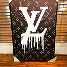 a louis vuitton sign with icing on it