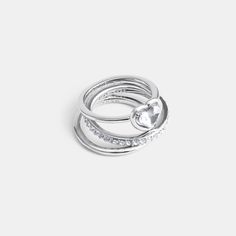 This set of stackable rings add a touch of sparkle to any look. It includes one polished band one pavé band and a heart bezel-set crystal ring. Wear together or separately. | Coach Halo Heart Ring Set - Women's Size 6 - Silver Heart Halo Ring, Pave Band, Crystal Ring, Crystal Rings, Stackable Rings, Women Accessories Jewelry, Womens Jewelry Rings, Bezel Setting, A Heart