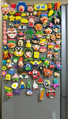 a refrigerator covered in lots of different magnets