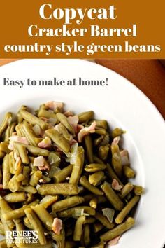 a white plate topped with green beans covered in toppings and text that reads copycat cracker barrel country style green beans easy to make at home