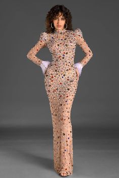 Enhance your charm with our long sleeve crystal maxi Dress, a vision of elegance and opulence. This stunning dress features long sleeves adorned with luxurious feathers at the cuffs, adding a touch of whimsical charm. The sheer fabric is embellished with sparkling crystals, creating a mesmerizing effect that captures the light beautifully. Perfect for glamorous parties, red carpet occasions, or upscale soirees. Handmade customization Fabric composition: 90% polyester fiber, 10% spandex Washing m Womens Cocktail Attire, Long Sleeve Bodycon Midi Dress, Concert Outfit Summer, Glamorous Party, High Fashion Outfits, Glamorous Dresses, Cocktail Attire, Summer Dress Outfits, September 2024