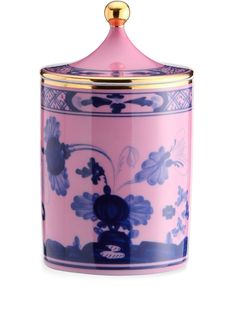 a pink and blue canister with flowers on it