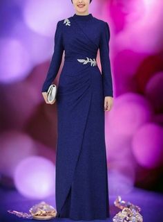 Our dress is made of 95% polyester, 5% elastane fabric. It is a lined dress. Product dimensions in the picture: size 40, bust 94 cm, waist 76 cm, hips 102 cm. The front of the dress is 160 cm Islamic Dress Design, Modest Soiree Dresses, Eid Evening Floor-length Maxi Dress, Blue Floor-length Abaya For Party, Blue Dress Hijab Soiree, Wedding Dress Islamic, Dress Nikah, Elegant Long Sleeve Blue Abaya, Festive Blue Maxi-length Abaya