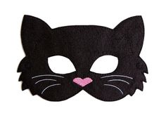 a black cat mask with pink eyes